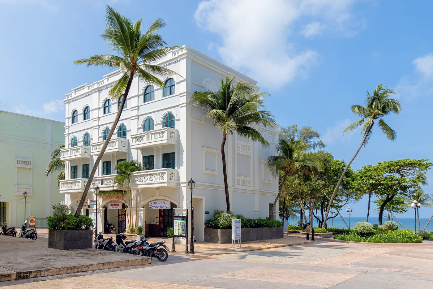Palm trees and the building beside the spa